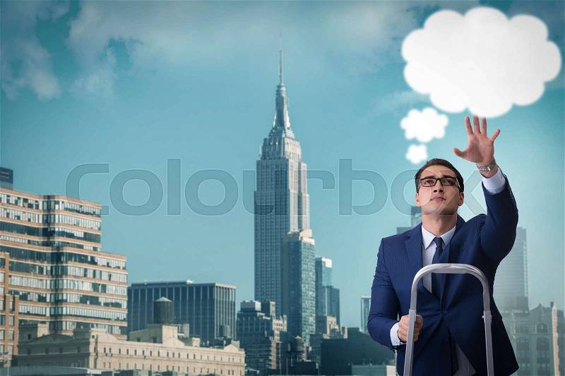 Businessman reaching out to callout message, stock photo