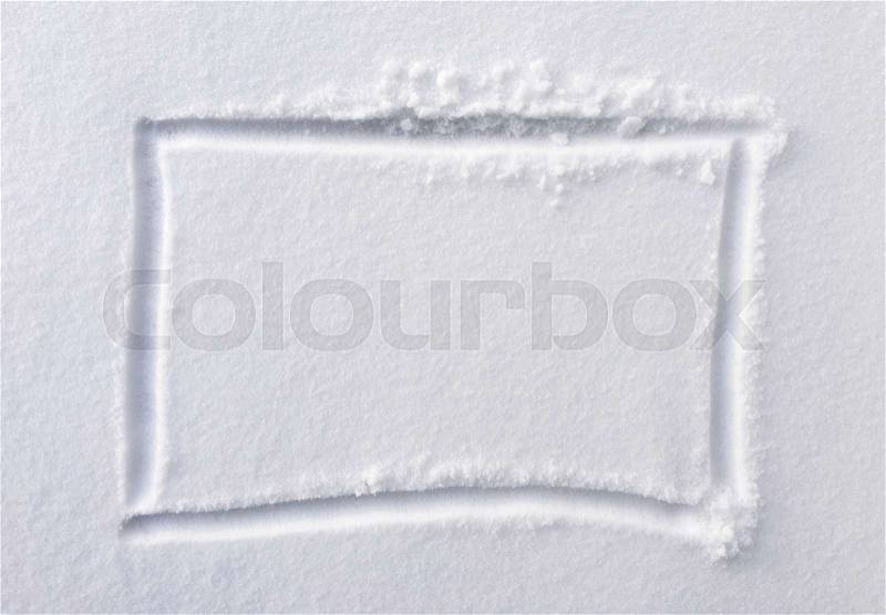 Hand drawn square shape in the fresh snow, stock photo