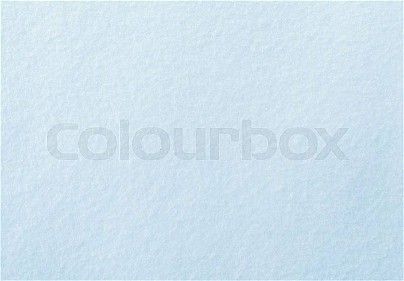 Background of fresh snow texture in blue tone, stock photo