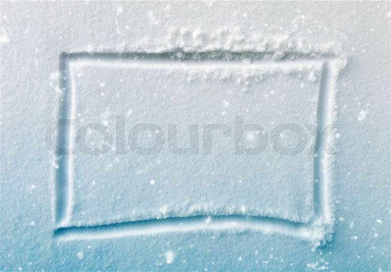 Hand drawn square shape in the fresh snow, blue gradient tone and snowfall effect, stock photo
