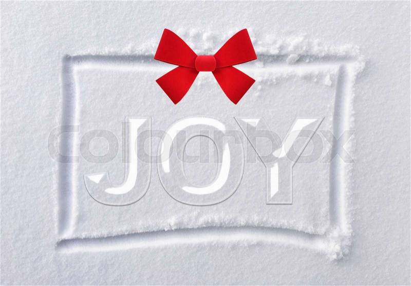 Hand drawn square shape on white clean snow with red bow and word JOY, stock photo