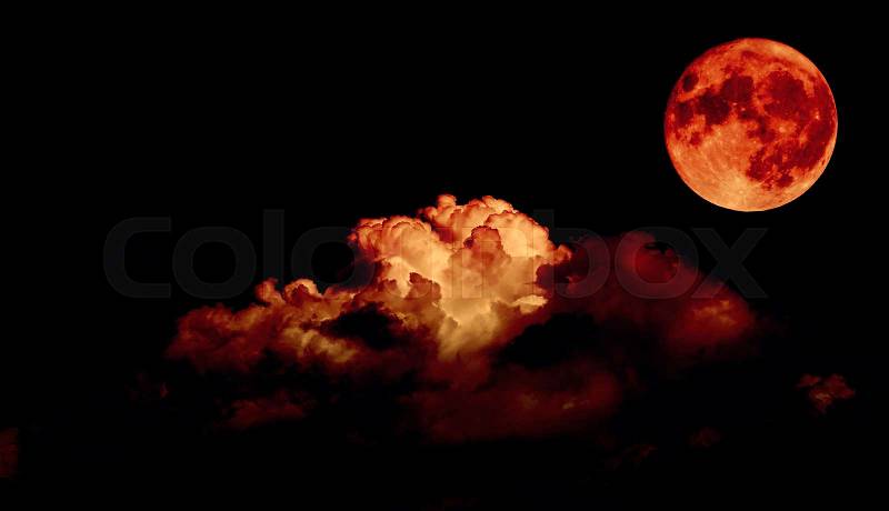 Night sky and a full moon in the clouds, blood moon concept , stock photo