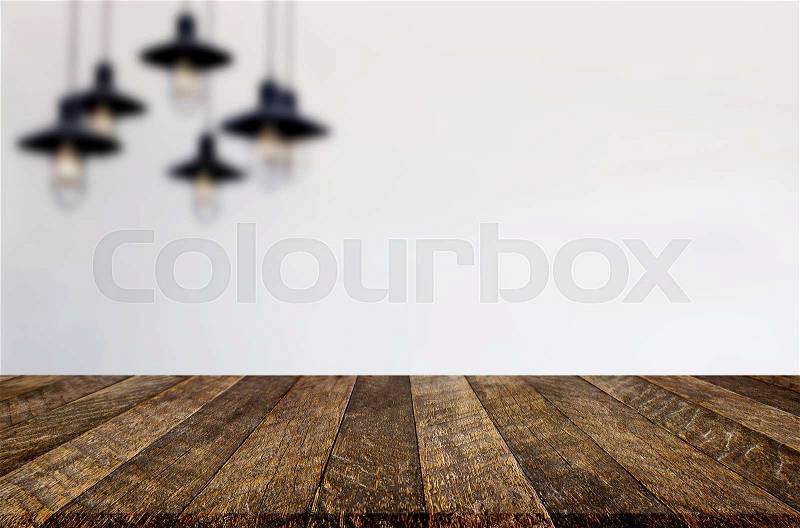 Selected focus empty brown wooden table and Coffee shop or restaurant blur background with bokeh image. for your photomontage or product display, stock photo