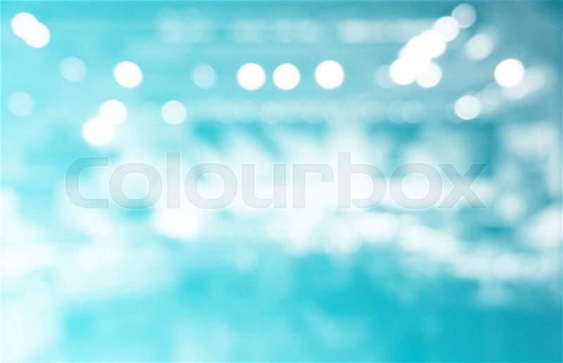 White blue bokeh blur of department store shopping background, stock photo