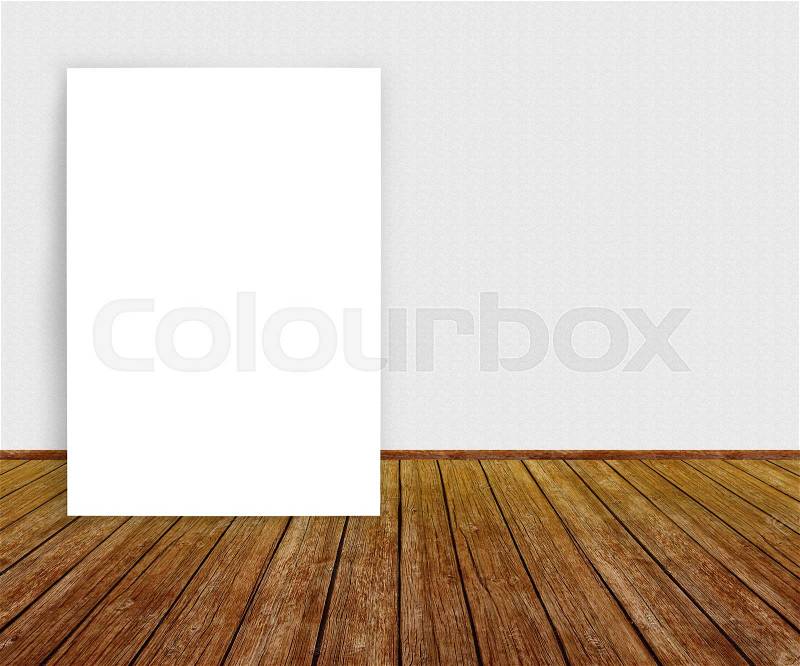 Blank white poster leaning on clean wall, mock up for your product or content, stock photo