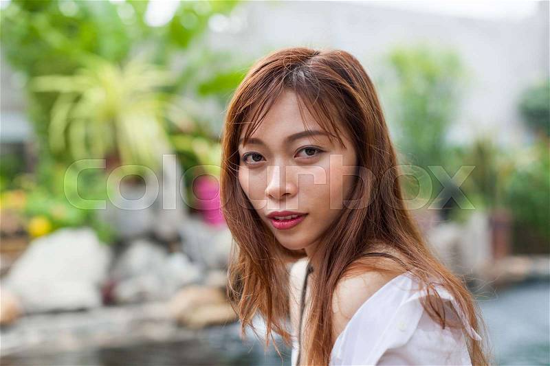 Beautiful Woman Swimming Pool At Resort Relaxed Portrait Young Asian Girl Tropical Vacation, stock photo