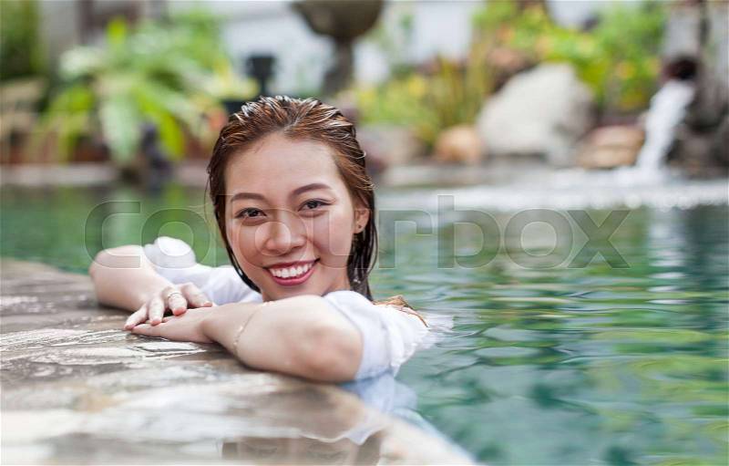 Beautiful Woman Swimming Pool At Resort Relaxed Portrait Young Asian Girl Happy Smile Tropical Vacation, stock photo