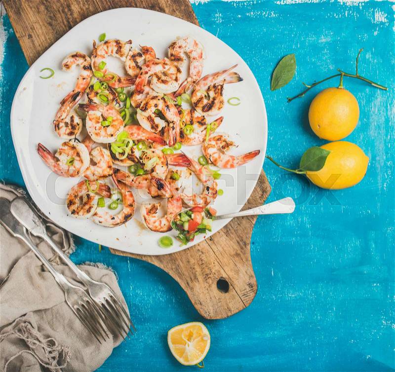 Seafood dinner with Grilled tiger, lemon, leek, chili pepper, stock photo