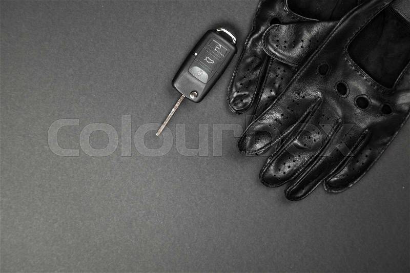 Car keys and a pair of leather driving gloves, stock photo