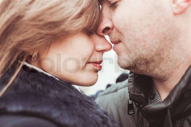 Gentle touch of a loving couple close-up, stock photo