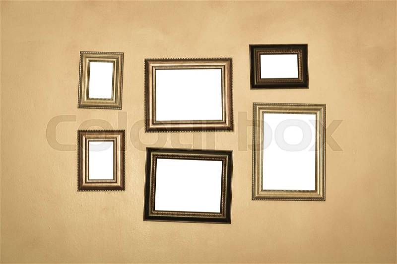 Vintage traditional realistic frames set on dark wall, stock photo