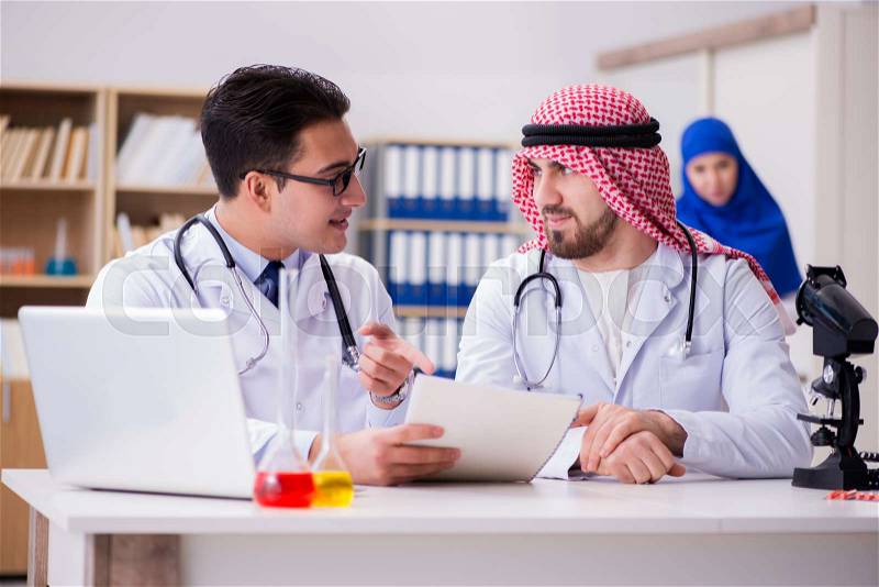 Diversity concept with doctors in hospital, stock photo