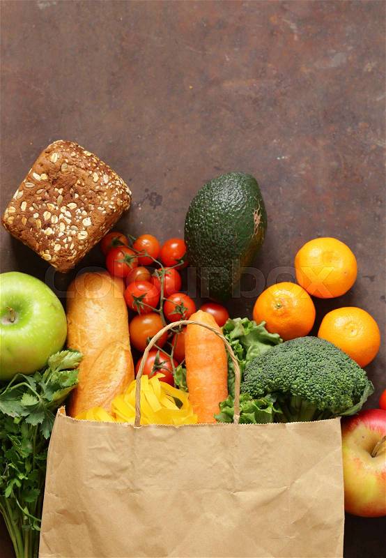 Grocery food shopping bag - vegetables, fruits, bread and pasta, stock photo