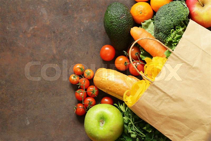 Grocery food shopping bag - vegetables, fruits, bread and pasta, stock photo