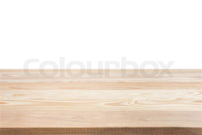 Empty top of wooden table or counter isolated on white background. Saved with clipping path, stock photo