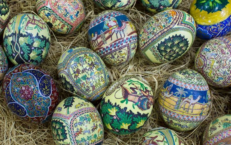 Traditional Arabic folk paintings on ostrich eggs on the eastern market, stock photo