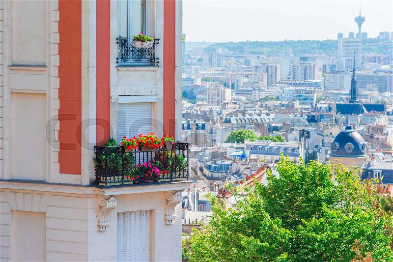 Beautiful european houses and balcony view in Paris, France. View to the city from Montmartre, stock photo