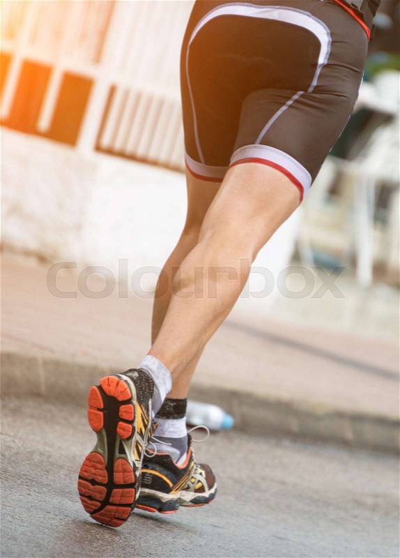 Racewalking. Marathon runner on the street, stock photo