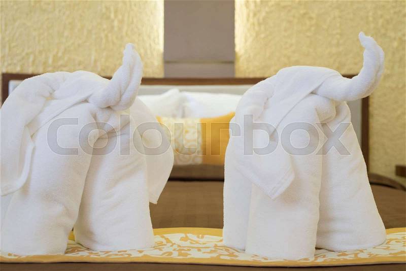 Elephant towel, art decoration in resort bedroom, stock photo