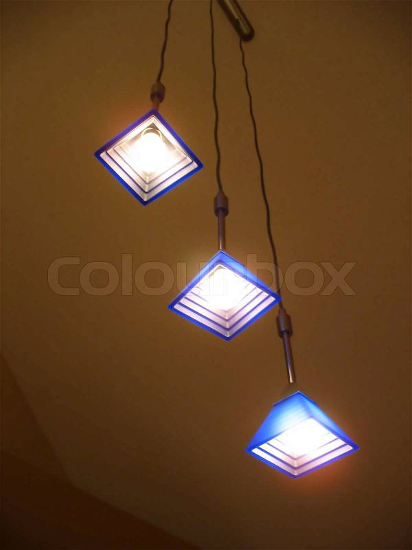 A trio of lights - contemporary interior lighting for the home, stock photo