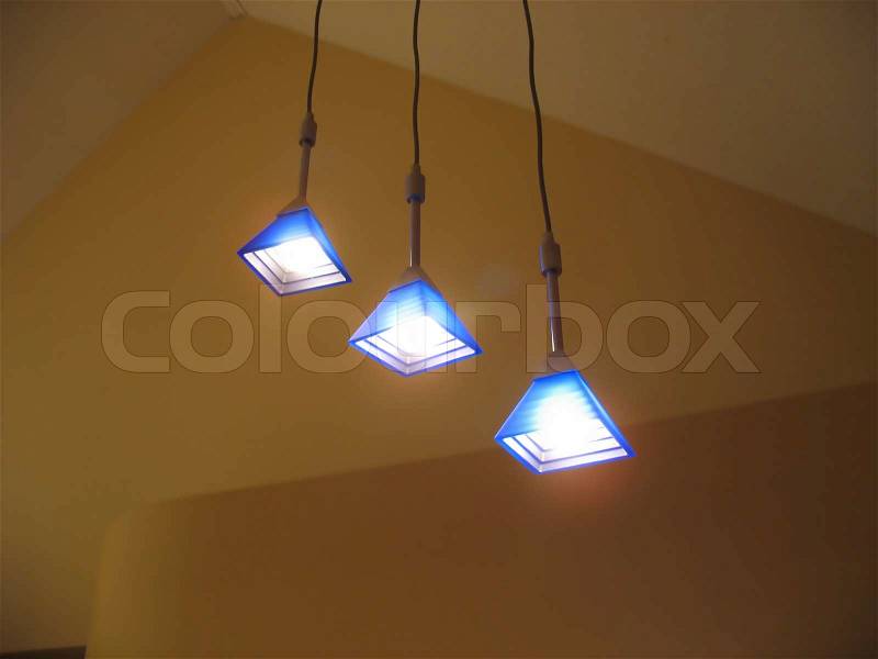 A trio of lights - contemporary interior lighting for the home, stock photo