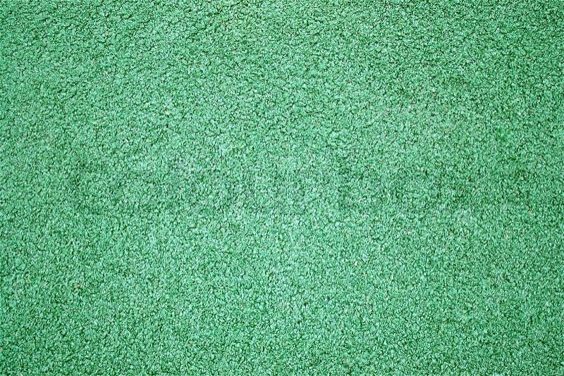 A green artificial astro turf texture commonly used in ball sports, stock photo