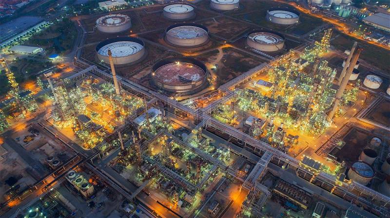 Land scape of Oil refinery plant from bird eye view on night, refinary plant with oil tank storage, Petrochemical plant, chamical plant, Chonburi, Thailand, stock photo
