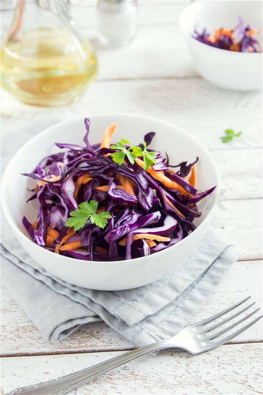 Red Cabbage Coleslaw Salad with Carrots and Parsley - healthy diet, detox, vegan, vegetarian, vegetable spring salad, stock photo
