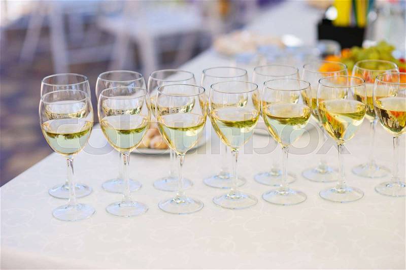 Champagne glasses on the table for the wedding buffet, stock photo