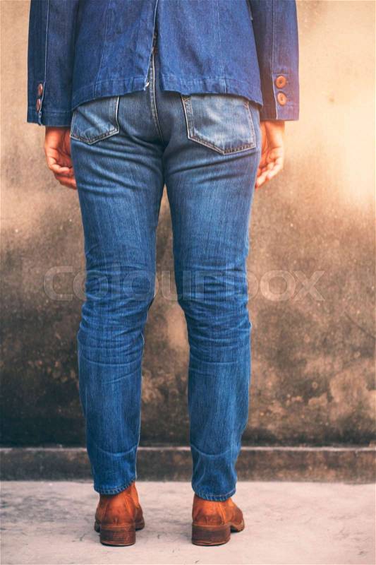 Woman with fashion blue jeans in the town, stock photo