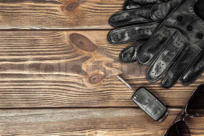 Car keys and a pair of leather driving gloves, stock photo