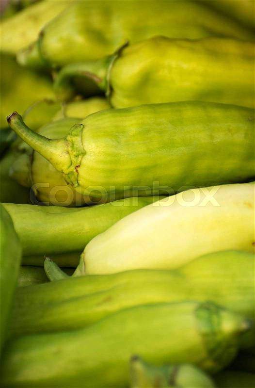Green banana peppers on the market, stock photo