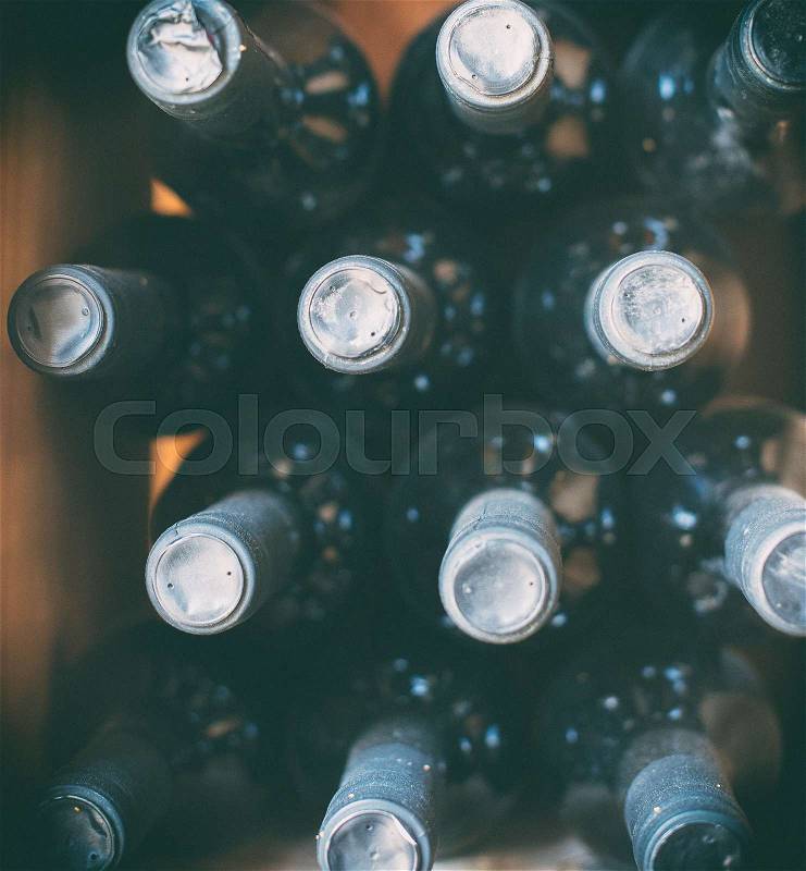 Wine bottles in the wine store. Top view, stock photo
