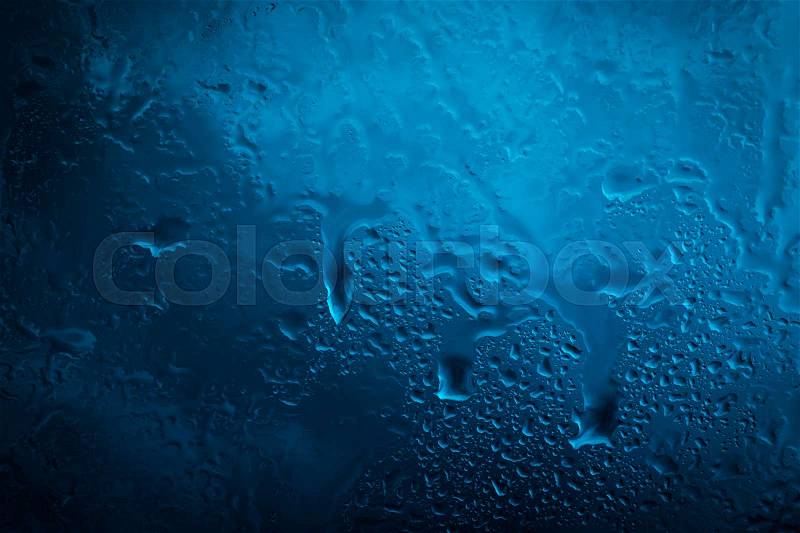 Drops of rain on glass , raindrops on clear window, stock photo