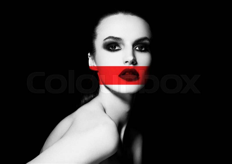 Beauty portrait black and white with red stripe on black background, stock photo