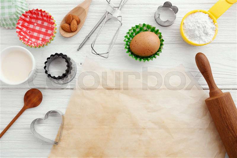 Baking background with baking paper and tools, stock photo