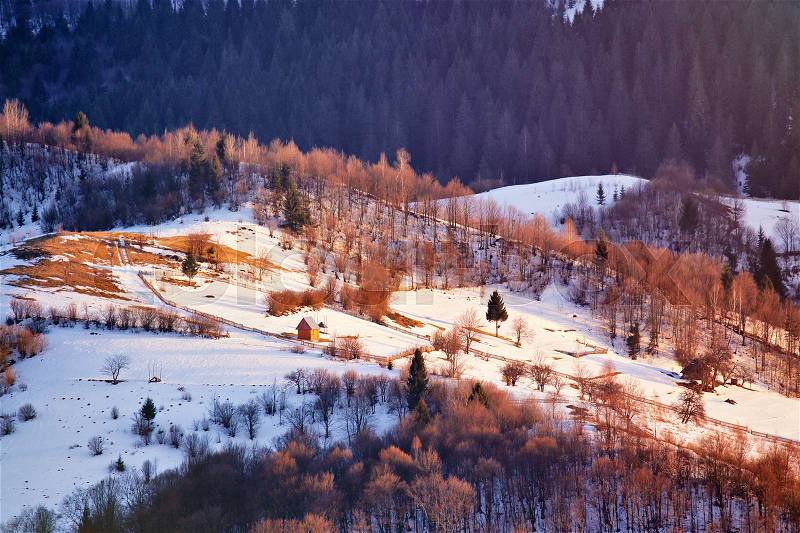 Early spring in mountains. Sunny rural winter scene. Winter panoramic aerial view landscape, stock photo
