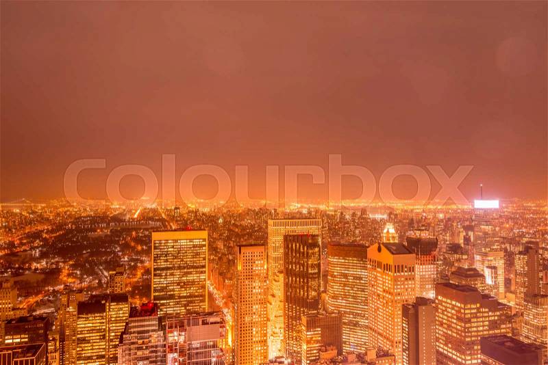 Night view of New York Manhattan during sunset, stock photo