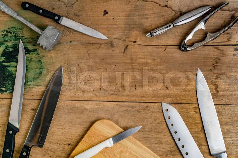 Top view of Kitchen ware utensils on wooden desk, stock photo