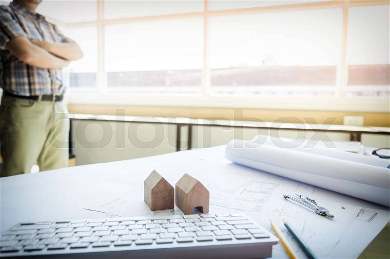 Architectural Office desk background construction project ideas concept, With drawing equipment with mining light, stock photo