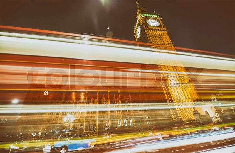 Car light trails under Westminster Palace, London, stock photo