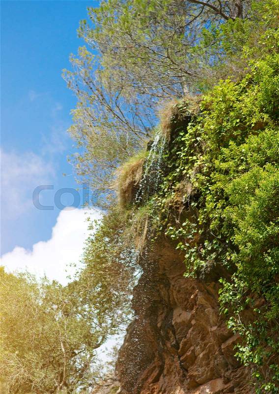 Beautiful view of natural waterfall in jungle, stock photo