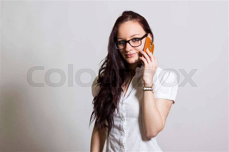 Young beautiful woman with mobile phone - horizontal image, stock photo