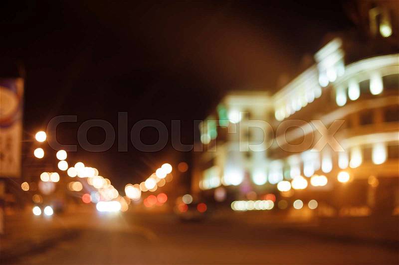 Night city street lighting lanterns and cars, stock photo