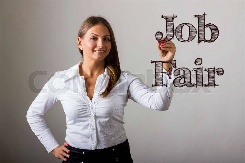 Job Fair - Beautiful girl writing on transparent surface - horizontal image, stock photo