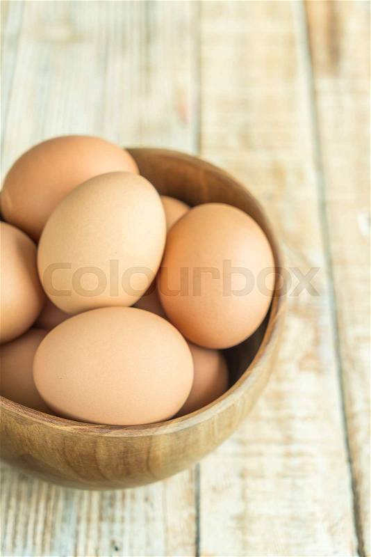 Chicken Egg on the wood old background, stock photo