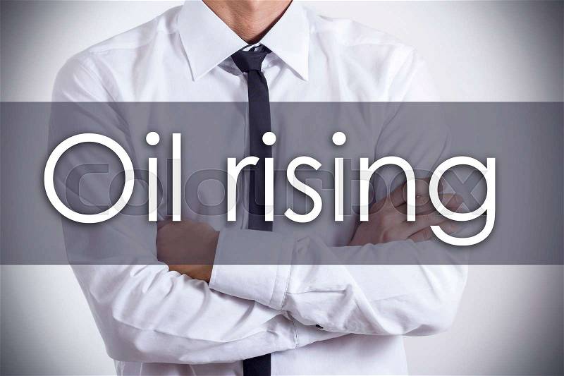 Oil rising - Young businessman with text - business concept - horizontal image, stock photo