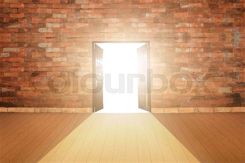 Wood doors opening with old cement wall and light coming in. background of old vintage white brick, stock photo