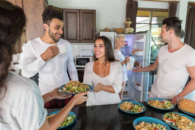 Young People Group Having Breakfast Together, Friends Kitchen Interior Morning Food Drink Happy Smiling Holiday Vacation, stock photo
