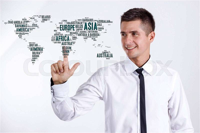 World map with country names - Young businessman touching word cloud - horizontal image, stock photo